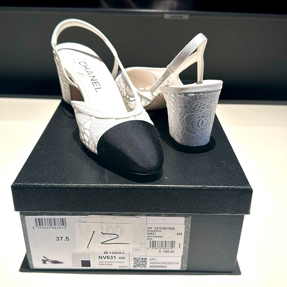 BRAND NEW Chanel Slingbacks in black and white lace!